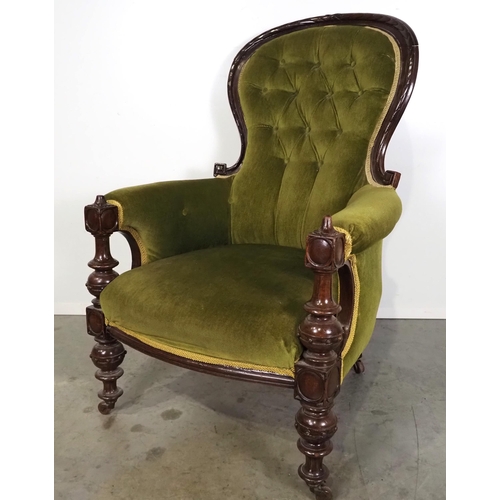 524 - Victorian carved button back armchair