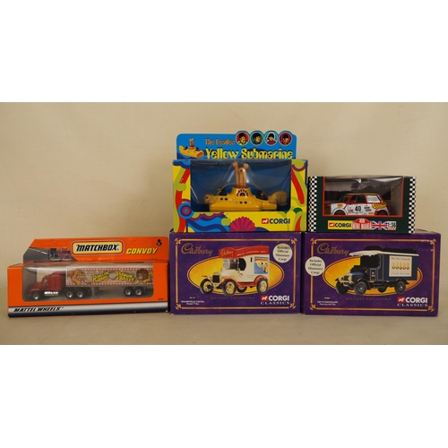 185 - Corgi and Matchbox model vehicles to include, The Beatles Yellow Submarine, Cadbury vans, circus lor... 