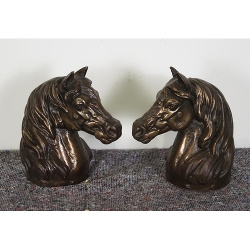 423 - Pair of cast iron horse heads 11