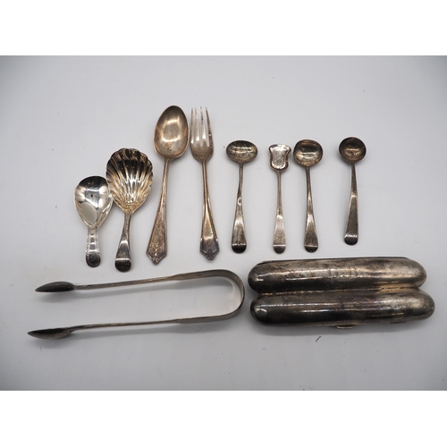 296 - Assorted silver items to include cigar case, salt spoons, sugar tongs, etc. Total weight approx. 247... 