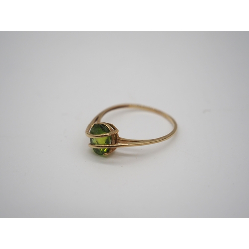 276 - 9ct Peridot ring, not hallmarked