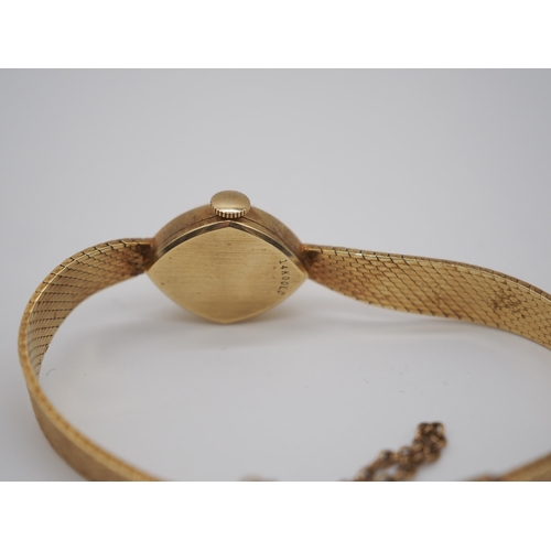 283 - 14ct Gold bracelet watch