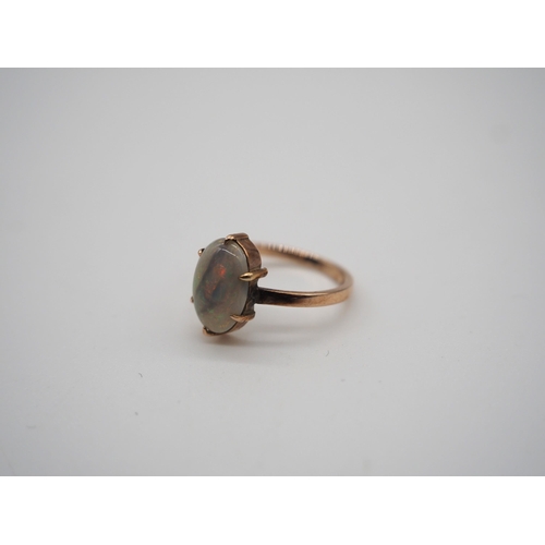 267 - 9ct Claw set opal ring