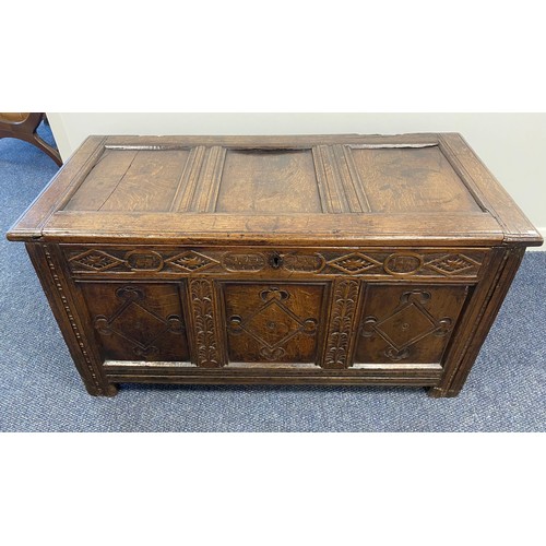 519 - Georgian 3 panel oak coffer with heavily carved front. H26