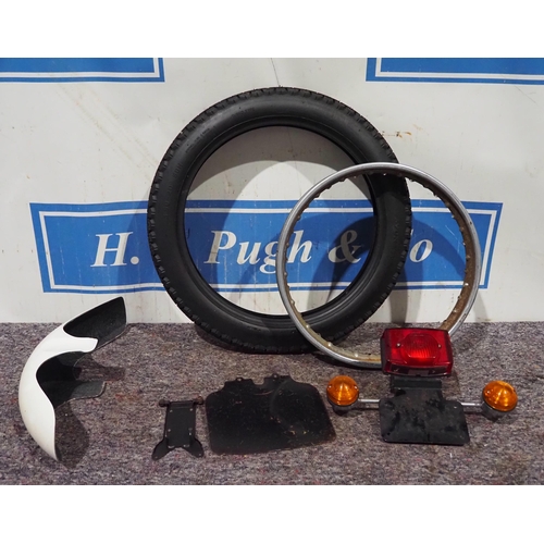 251 - Motorcycle tyre, rim and other parts