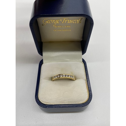 419 - 18ct Yellow gold 9 stone channel set diamond eternity ring. Approx. 4.1g