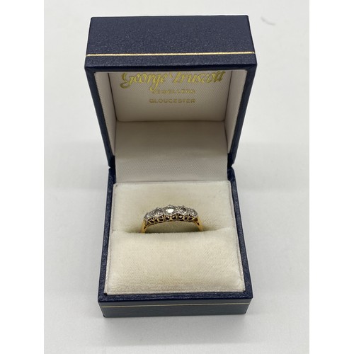 420 - 18ct Yellow gold 5 stone diamond ring. Approx. 2.7g. Center stone approx. 10 points