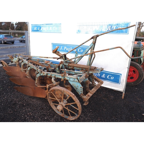34 - Ransomes 4 Furrow trailed plough. YL57 boards, with discs and skimmers