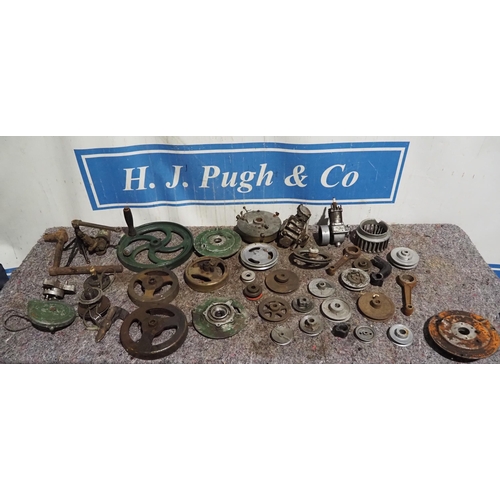 164 - Mixed flywheels, starting handles and other engine spares