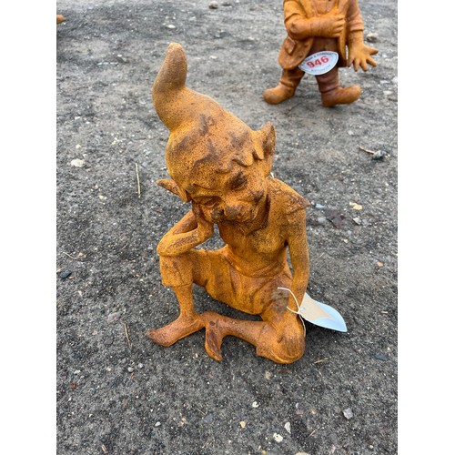 945 - Cast iron sitting pixie