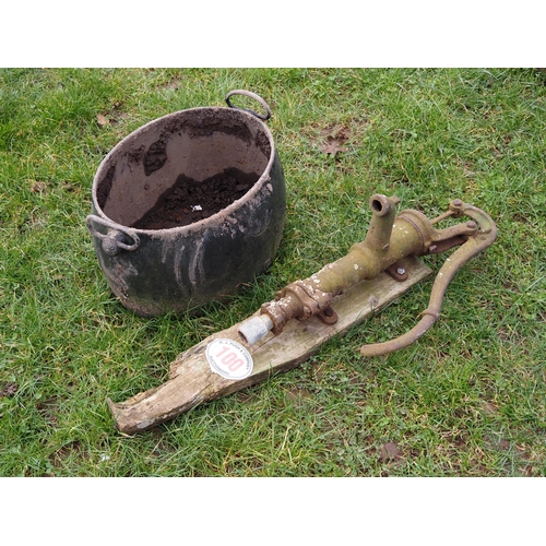 100 - Cast iron cauldron and water pump