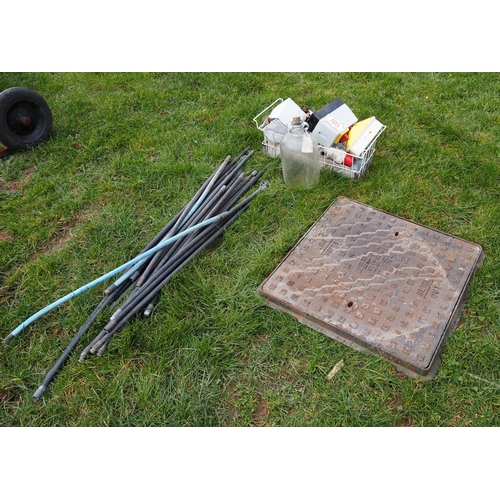 105 - Manhole cover, drain rods, etc.