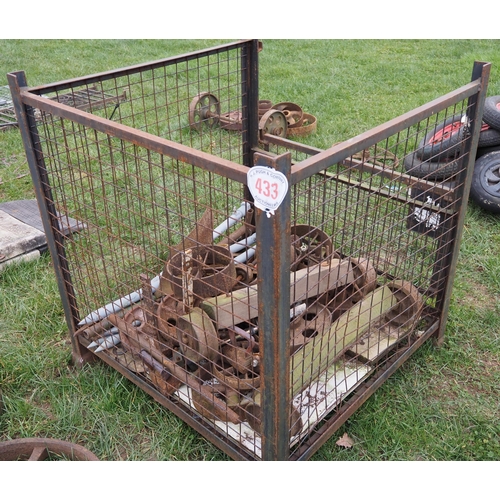 433 - Stillage of cast iron wheels, etc.