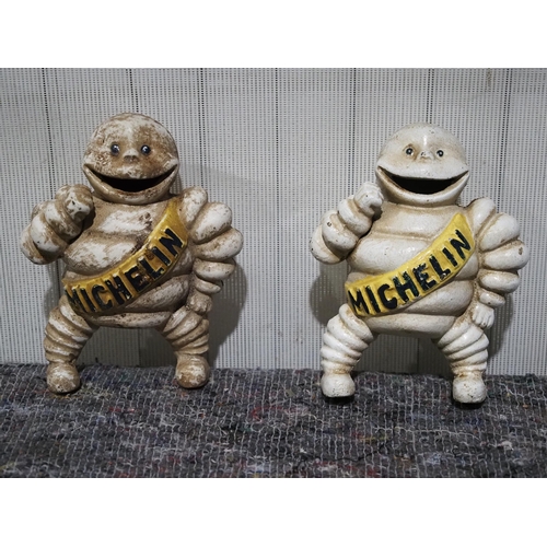 518 - Metal Michelin man money boxes 6