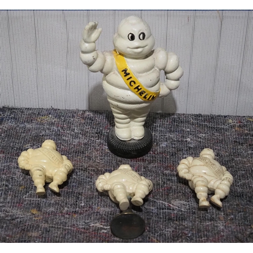 519 - Plastic Michelin man figures 4½