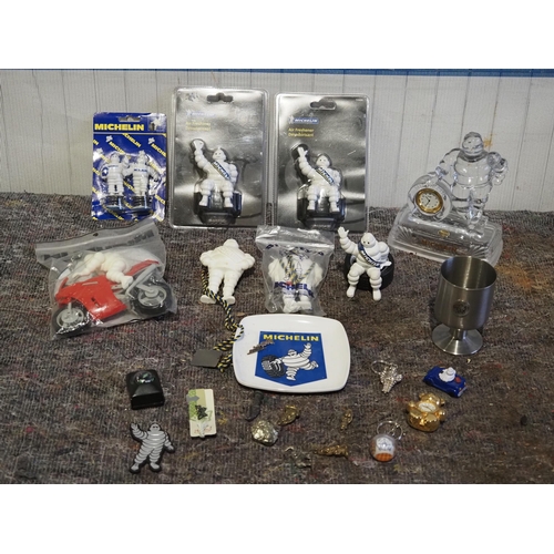 522 - Assorted Michelin merchandise to include ashtray, clocks, air freshers, etc.