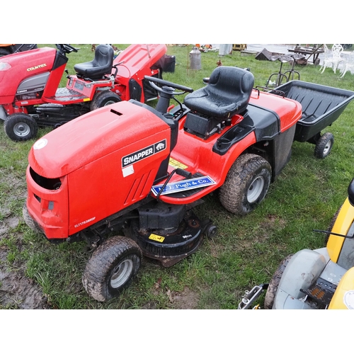 4 - Snapper ride on mower with trailer. Key in office