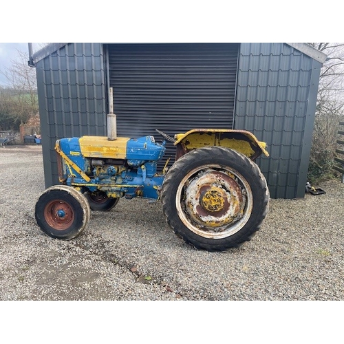 570E - Ford 4000 tractor. Runs and drives. Fitted with front bonnet guard, disc brakes and County rear fend... 