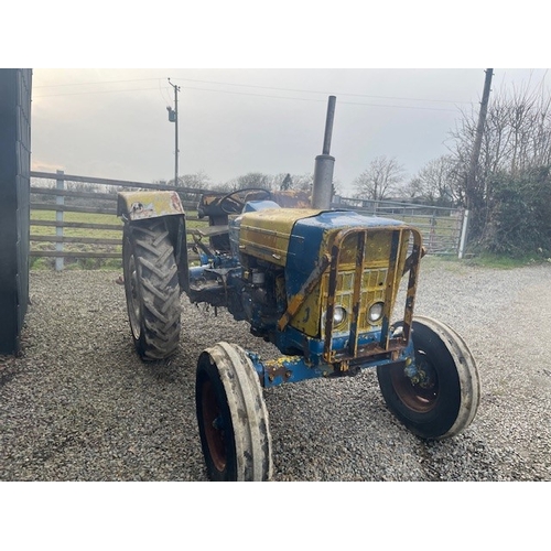 570E - Ford 4000 tractor. Runs and drives. Fitted with front bonnet guard, disc brakes and County rear fend... 