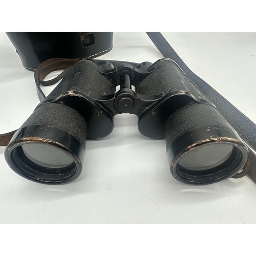 371 - Rare German 7x50 Carl Zeiss Dienstglas binoculars complete with case and strap stamped 1944 and with... 