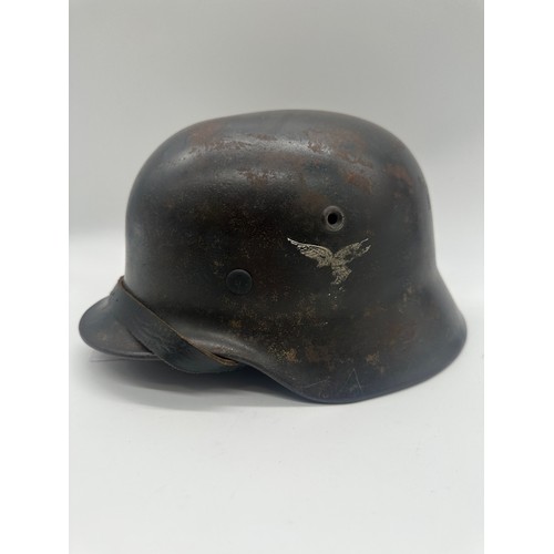 363 - German Luftwaffe M40 helmet by ET64 with soldier name on the neck