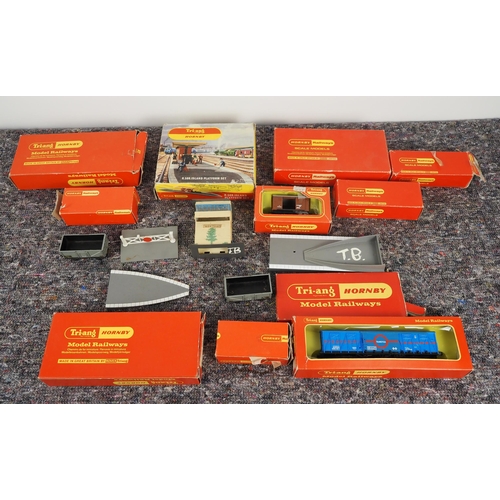 64 - Quantity of Tri-ang Hornby carriages, platform set and other infrastructure with brochure