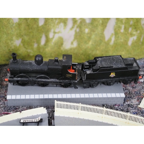 88 - Quantity of railway infrastructure, OO gauge locomotives, carriages and other accessories