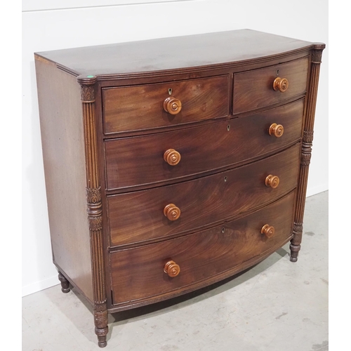 687 - 19th Century bow front chest of 2 short and 3 long drawers in mahogany with fluted side columns H42