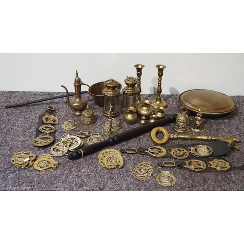 153 - Quantity of brass items to include horse brasses, candle sticks, bed warming pan, etc.