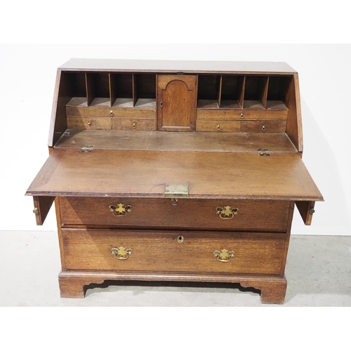 694 - Georgian bureau in oak with brass handles on bracket feet H40