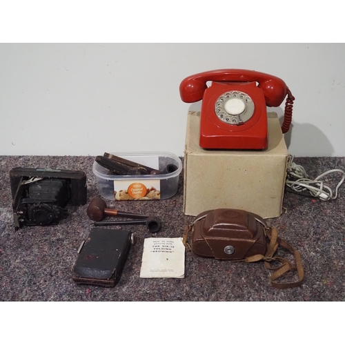 132 - Vintage telephone, cameras and pipes