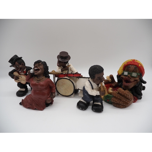 124 - Resin jazz band figures and Jamaican ash tray