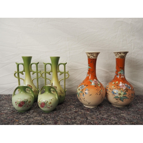 222 - Pair of Oriental flower vases, pair of vases with wild animals on and small pair of vases