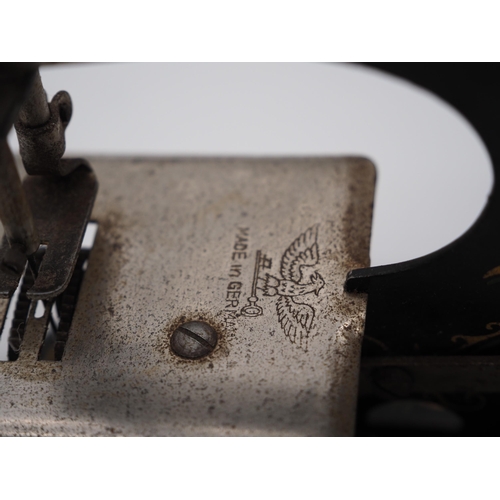 232 - Small German made toy sewing machine 6