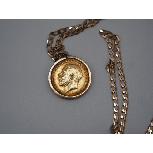 320 - Gold sovereign 1911 in 9ct gold chain and clasp. Total weight approx. 15.4g