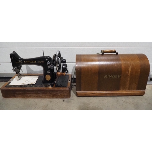 115 - Portable Singer sewing machine in case