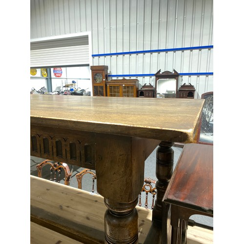 605 - Oak refectory table with carved detailing and stretcher H30