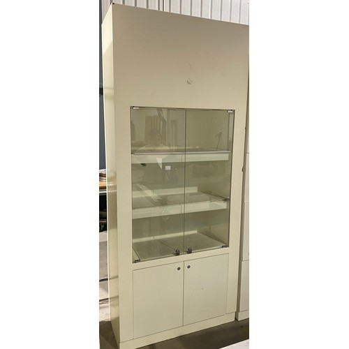 818 - Shop display cabinet with drawers below 94