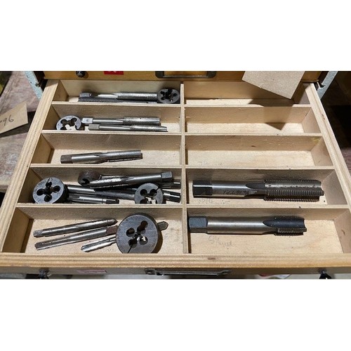 695 - Wooden 9 drawer unit and contents to include over 250 taps and dies in different sizes