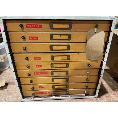 695 - Wooden 9 drawer unit and contents to include over 250 taps and dies in different sizes