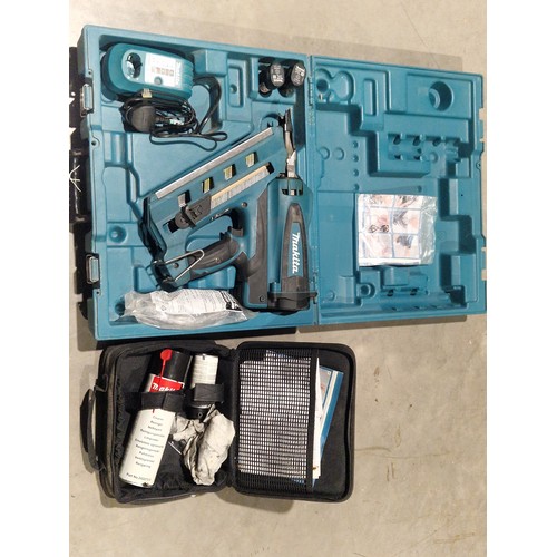 537 - Makita GN900 cordless nail gun and Makita industrial cleaner