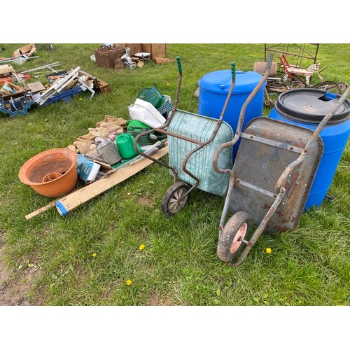 764 - Wheelbarrows, water drums and other garden equipment