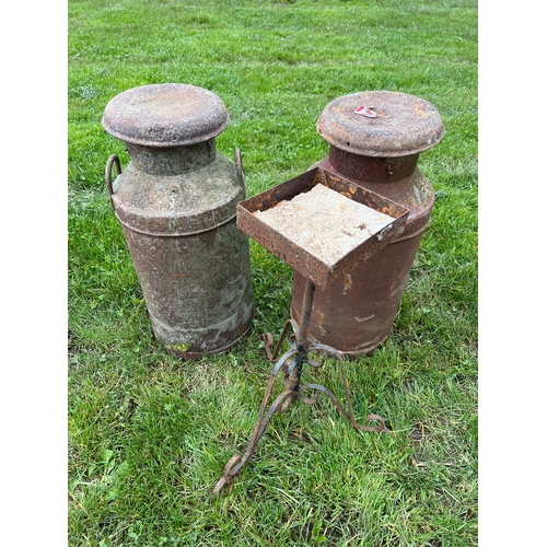 953 - Milk churns and metal stand