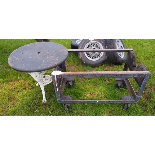 676 - Cast iron circular table and metal trolley