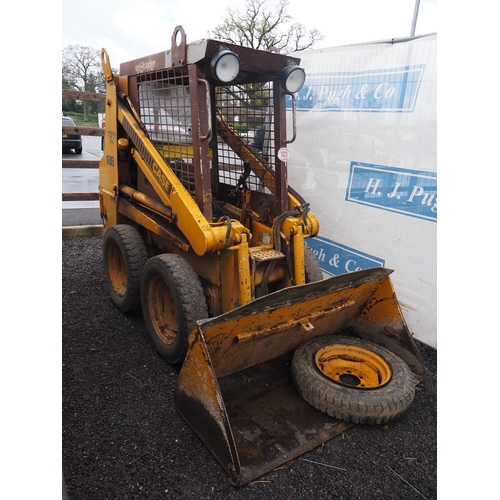 1623 - Case 1818 skid steer with bucket, pallet tines, grab and drawbar. Key in office