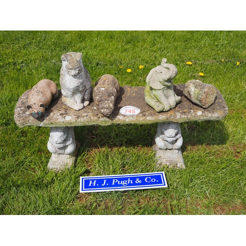 745 - Mixed garden ornaments and bench