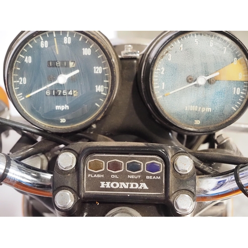 923 - Honda 750 Four motorcycle. 1972. 736cc. 
Frame No. 2024351
Engine No. 2031888
Engine turns over but ... 