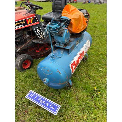 64 - Clarke air compressor. Good working order, new engine. Key in office