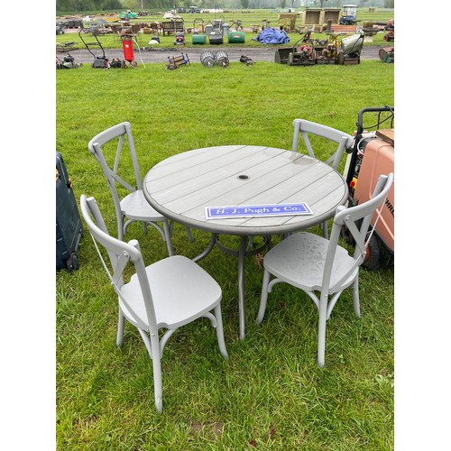 67 - Round garden table and 4 chairs