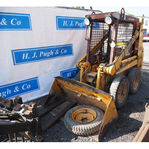 1724 - Case 1818 skid steer. C/w grab, bucket, tines, spike and drawbar